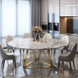 Tavolo da pranzo moderno rotondo con effetto marmo bianco e base oro DORONE